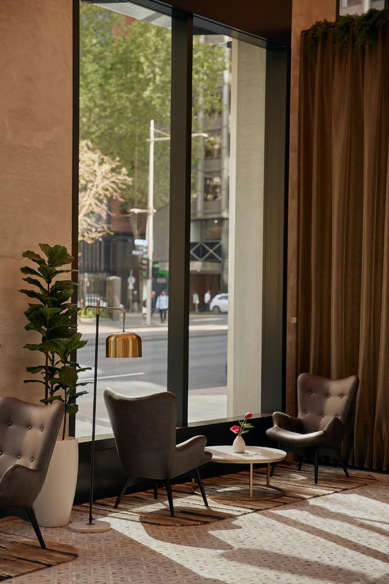 Meriton Suites Melbourne Exterior foto The interior of the hotel
