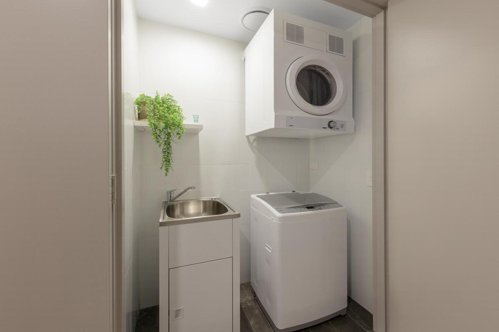 Meriton Suites Melbourne Exterior foto Laundry room